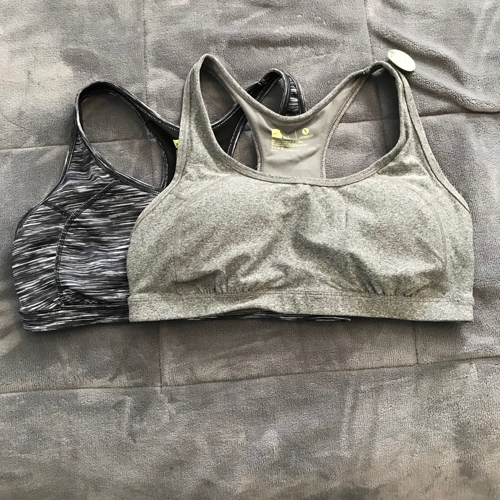 2 PK XERSION SPORTS BRAS. 1 is BRAND NEW. Size XL